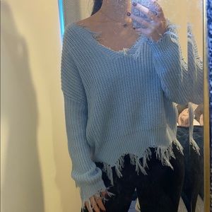Light blue sweater
